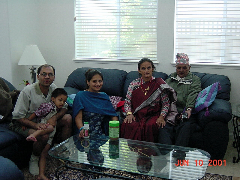 Prem and Family in the living room.jpg