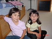 Tara and Sonia watching a cartoon movie