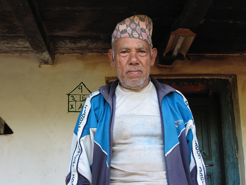 07-03-26-181229.JPG - Hom Prasad Subedi - Maoist almost killed him. He described how Maoist came to his house and took him to a nearby creek and started beating him and broke his both hands and legs, accusing him of capturing many leadership roles.