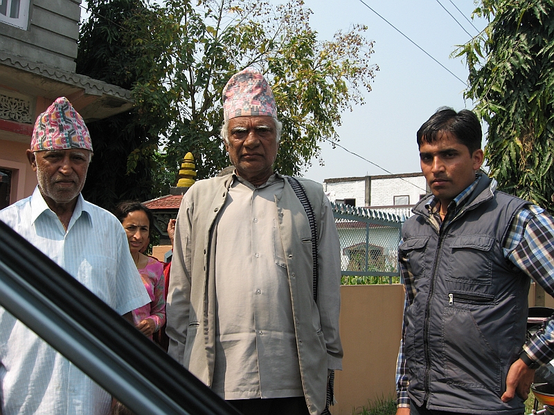 07-03-29-204741.JPG - Homnath (middle) was the tax collector and Village leader of Thulipokhari. Now, he lives in Chitwan. My father is on the left and Geeta's husband on the right.